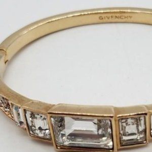 VTG GIVENCHY PARIS NEW YORK SIGNED BRACELET SHINY GOLD TONE HINGED BANGLE